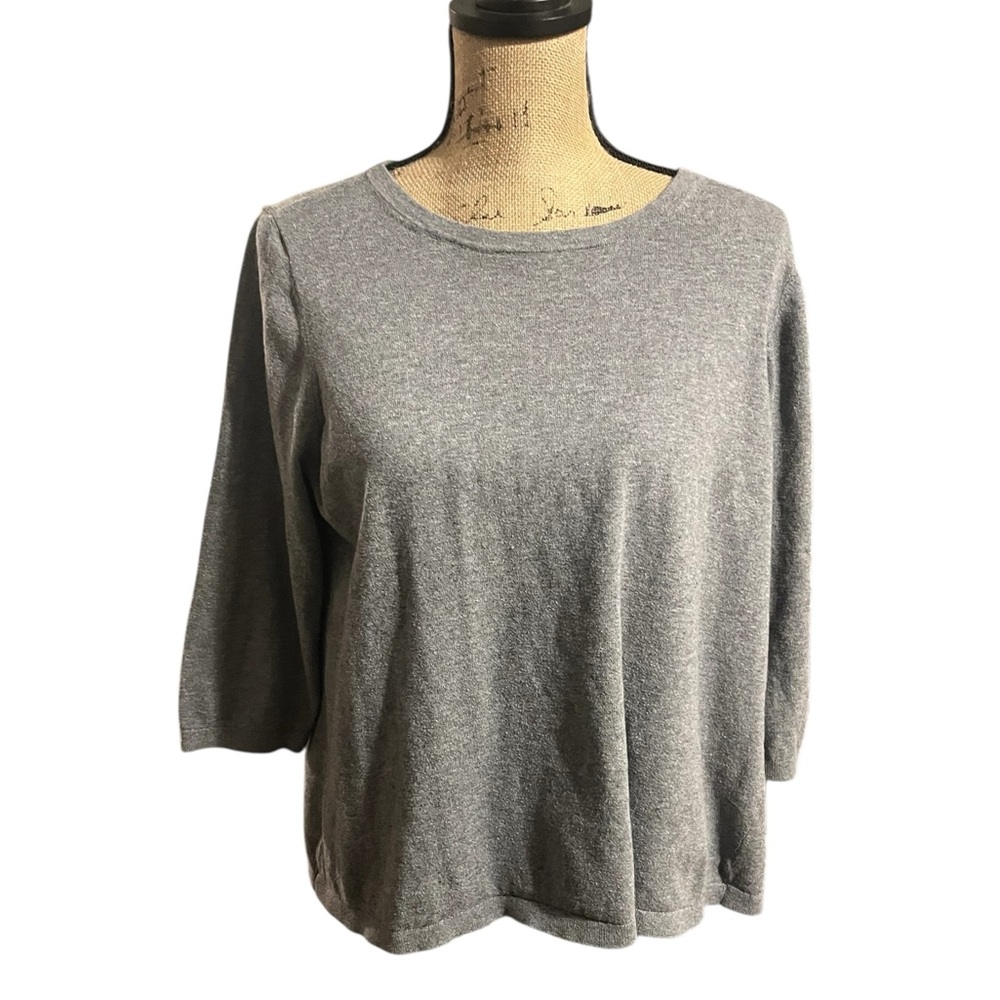 Unknown brand, unknown size sweater with dual fabric back and ties.